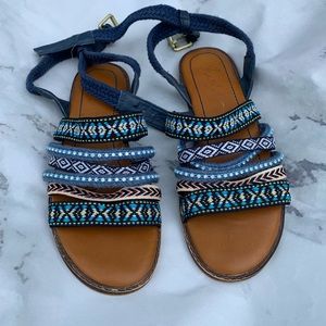 Aztec styles sandals.